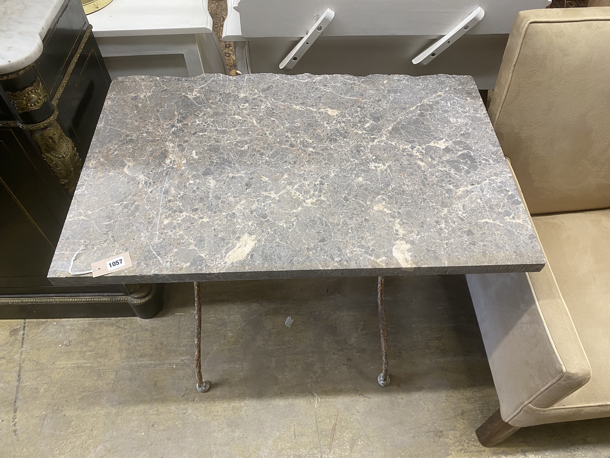 A rectangular marble topped wrought iron garden table, width 93cm, depth 60cm, height 73cm